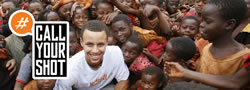 Banner photo of a group of children and professional basketball player Stephen 