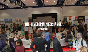 People looking at exhibits at the DevelopmentXChange