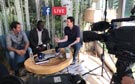 Three speakers around a table for a Facebook live event