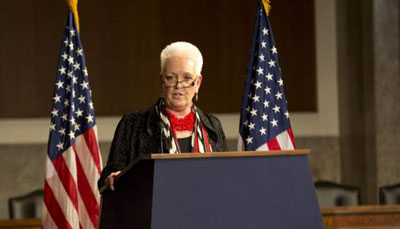 Gayle Smith speaking from a podium