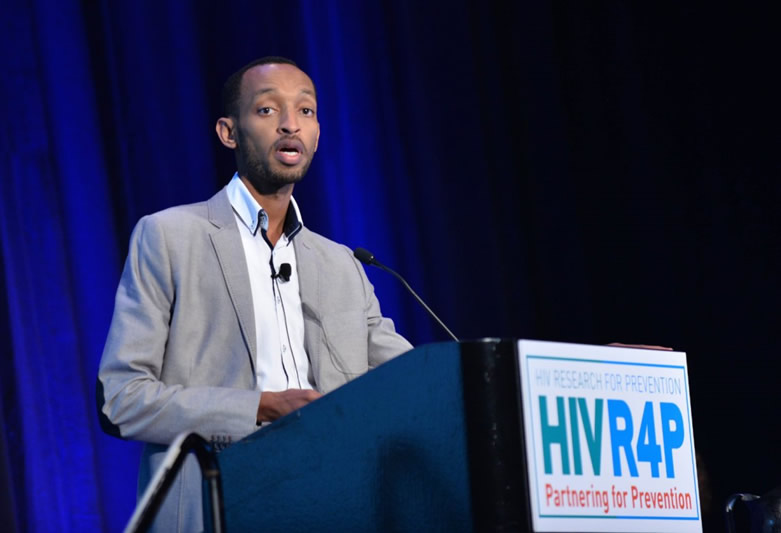 USAID-supported scientist, Julien Nyombayire, presents during a session on vaccines at HIVR4P. Photo credit: HIVR4P