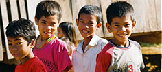 Children outside of the health center in Kampong Thom province in Cambodia, where oral re-hydration therapy is provided to children who have diarrhea. / PATH/Heng Chivoan