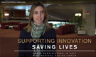 A woman looks at the camera with a lounge in the background. Supporting Innovation: Saving Lives