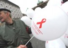 A Serbian activist holds balloons Dec. 1, 2010, during a World AIDS Day rally in the center of Belgrade. At the time, a U.N. exp