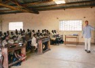 Tuve Floden, a Peace Corps volunteer in Benin, teaches schoolchildren English.
