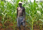 Farmer James Sworo with the maize he planted two months earlier in Kajo Keji County, South Sudan 