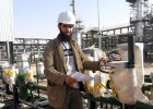 Bilel Boutadjine, an engineer and former University of Mentouri Constantine (UMC) student, is pictured at his job at KIS Co. Bil