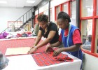 Masai fabrics are hand cut in preparation for custom-made Doreen Mashika handbags.