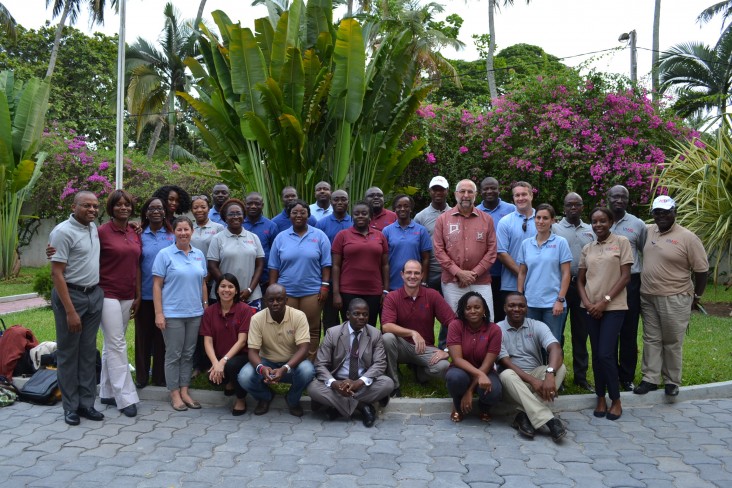 USAID/Côte d'Ivoire team stands for a family picture