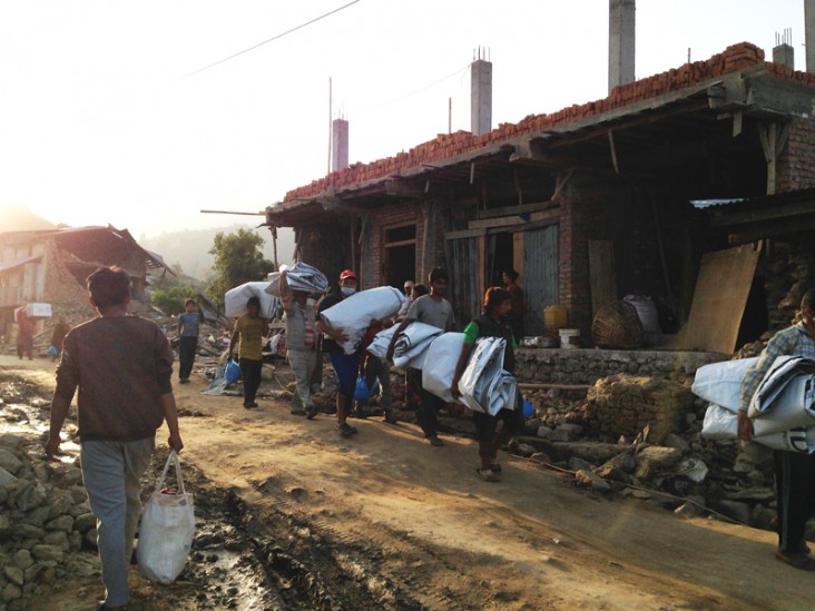 Distribution of heavy-duty plastic sheeting by partner ACTED in Sankhu village outside Kathmandu. Credit: USAID