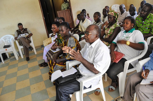 Local community members provide input on the future of a new school USAID is building in Languibounou in the Gbeke region