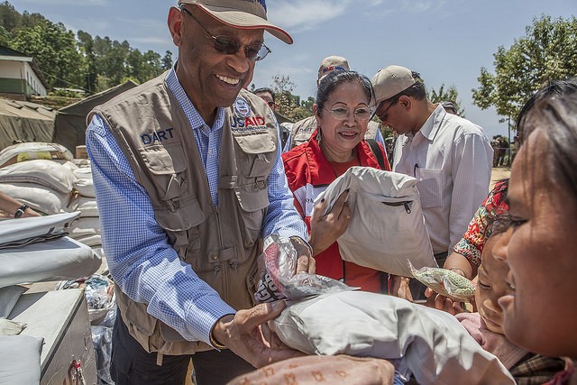 USAID Acting Administrator Alfonso E. Lenhardt distributes baby packs and hygiene kits in Sindhupalchowk, Nepal