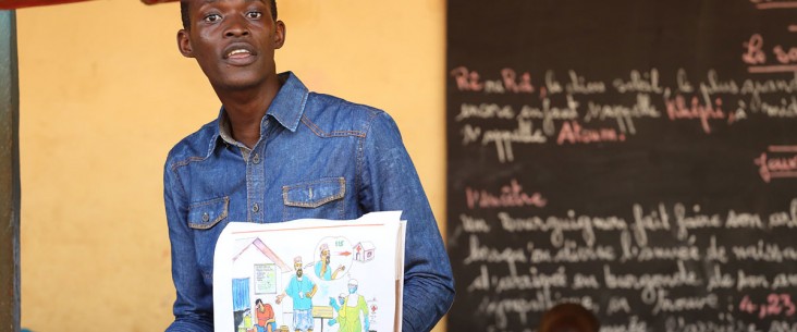 Mohamed Camara a teacher at Le Salem School talks to students about Ebola safety and prevention, in Conakry, Guinea
