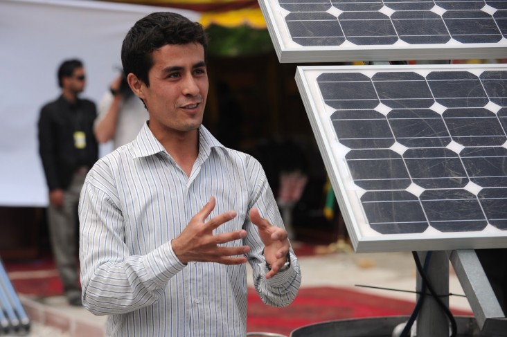 Ahmad Murtaza Ershad explains a solar power project during the dedication of the USAID-funded Kabul University Renewable Energy 