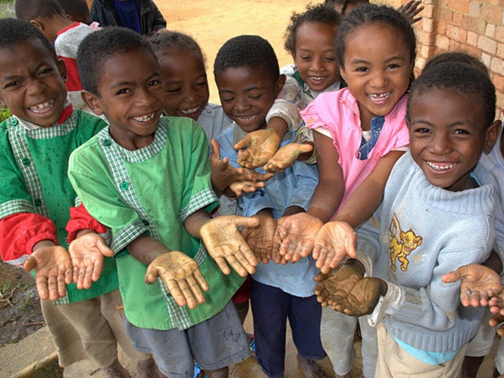 Children Proudly Show Their Lathered Hands Before Rinsing