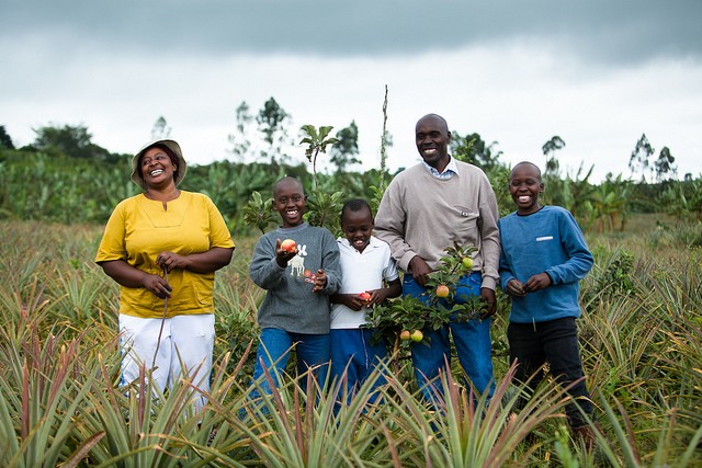 DCA borrower, Atuhaire Justine and her husband, Huntington, at their farm outside Mbarara, Uganda 