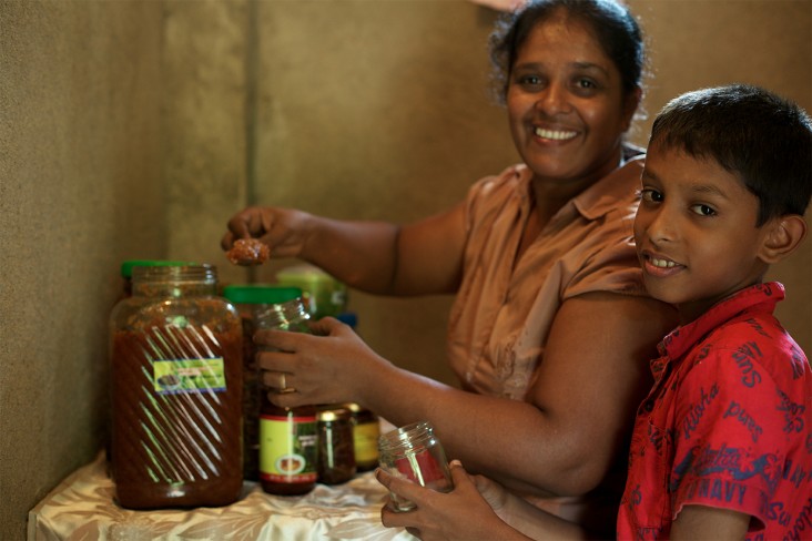 A mother and son make a chutney in Sri Lanka. 