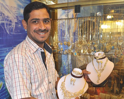 Five microloans totaling $38,000 helped Saad Abdul Ridah Hassan build four retail shops, a wholesale warehouse and a city-wide d