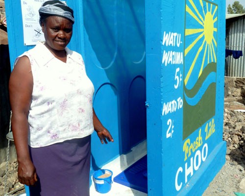 This woman runs one of Sanergy’s sanitation centers and makes a profit by charging each customer a small fee. Customers can sign