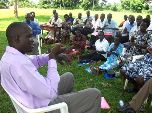 Teachers attend a session on basic skills in sign language at Buckely Primary School, Iganga, Uganda.  