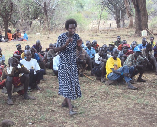 Maria Nakut, peace committee member from Moroto district, at a community dialogue.
