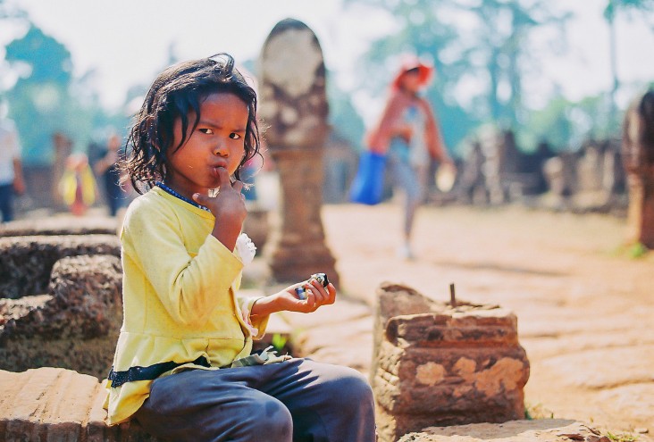 A child beggar in front of Banteay Srey Temple, Cambodia.