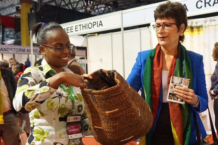 U.S. Ambassador to Ethiopia Patricia Haslach checks some of the quality merchandise on display at the international trade fair d