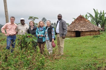 Dr. Andrew Umhau (left) and Whitney Ball (4th from left) meet with Metad and Renew members in the Ethiopian countryside.