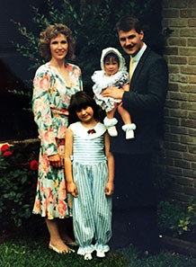Diana (age 8) with her parents and sister