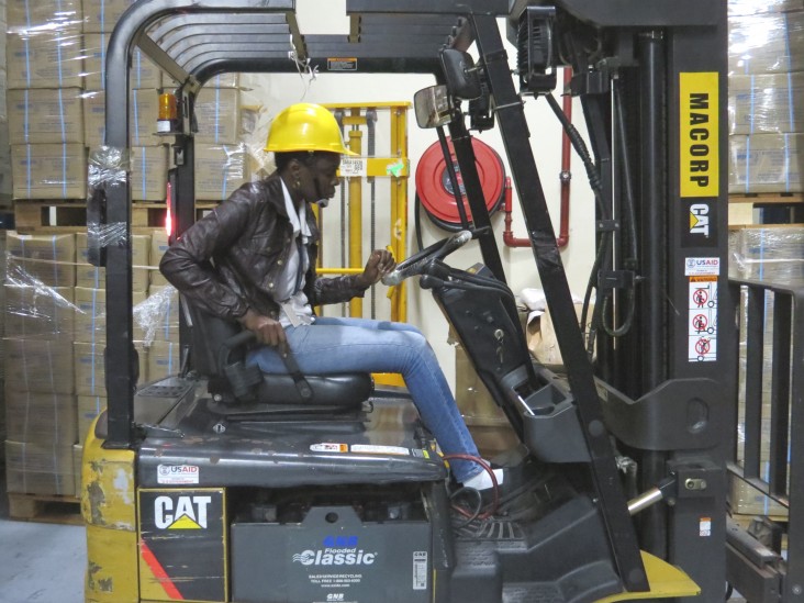 The facility’s lone female forklift driver is at home in the male-dominated environment.