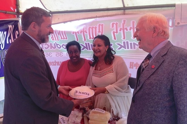 USAID representative Gary Robbins, Azu Dairy owner Meskerem Solomon, Wahl Milk owner Emebet Mekonnen, and CNFA board chairman Jo