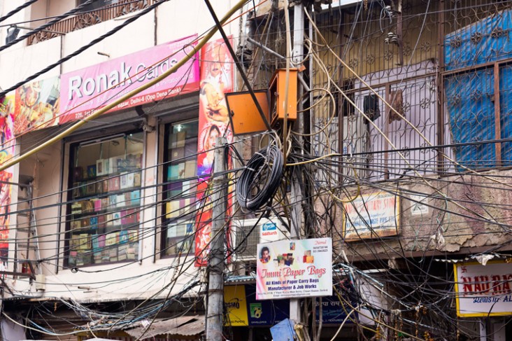 A distribution pole showcases electricity theft that drove much of the non-technical losses in in New Delhi