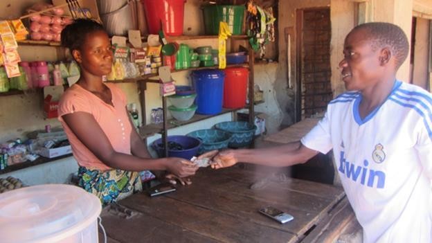 Rita Mbewe has customers from her community, and her income has improved.