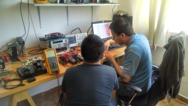 Engineers Moisés Daniel García Rojas, left, and Fortino Mendoza-Mondragón work on LiCORE’s smart transformer.