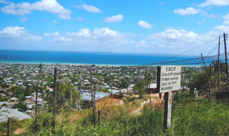 A sign reads “prohibited to build houses and farms” in a neighborhood in Pemba, where many landslides occurred in 2014.