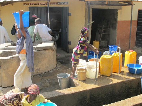 Bauchi town residents get water from a public standpipe.
