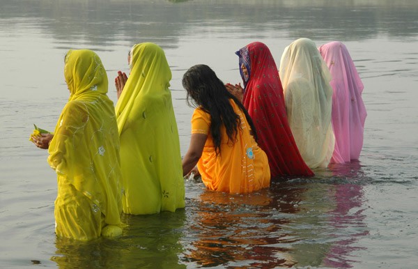 Women pray in the Ganges River in India. Water is central to many faiths, including Hinduism, Islam, Christianity, and Judaism. 