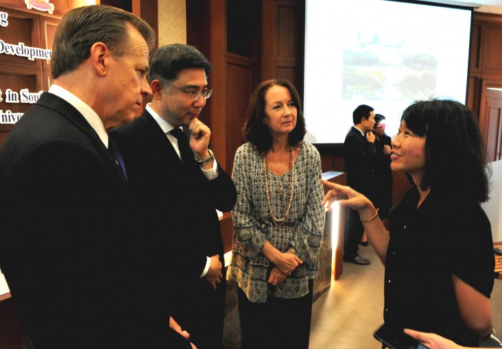Paritta Wangkiat, a Thai journalist, right, interviews U.S. Ambassador Glyn T. Davies, Chulalongkorn University President Bundhit Eua-arporn, and USAID Regional Development Mission for Asia Director Beth Paige.