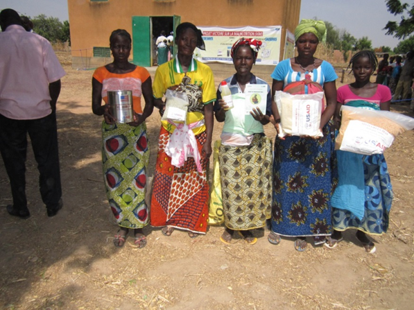 Women receive pre-packaged food rations