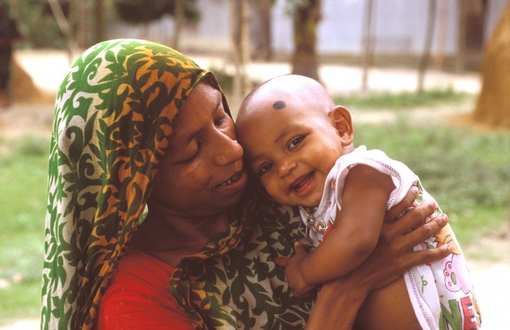 A woman  and child at a community nutrition center in Bangladesh