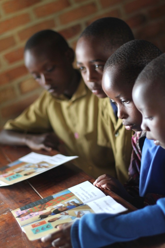 Students read in Beatha Nikuze’s third grade classroom at Kanyinya Primary School.