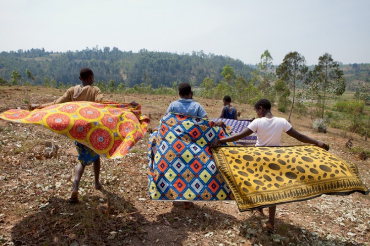 Girls mat weaving club from the Huye District in Rwanda having fun