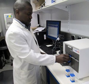 A USAID-supported lab in Zambia uses new technology to improve TB diagnosis. 