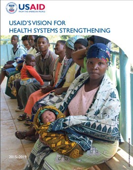 The cover of USAID's Vision for Health Systems Strengthening showing people waiting at a medical facility.