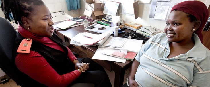 Lungile, an HIV-positive mother-to-be, receives counseling from a health care worker at a clinic in Swaziland. 