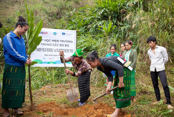 Local farmers attend a USAID-supported training on how to plant bo bo trees in the central province of Nghe An.