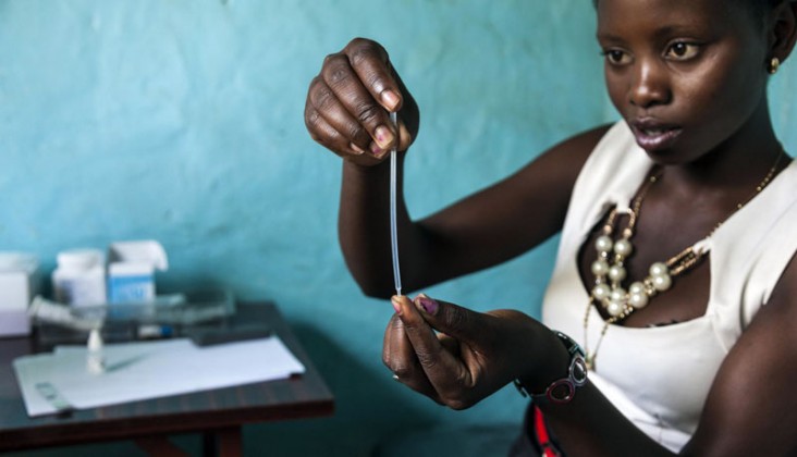 Sexual and Reproductive Health Field Trainee Prudence Chimanda practices the procedure for testing for HIV in Zambia