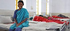A woman recovers in the hospital after fistula surgery