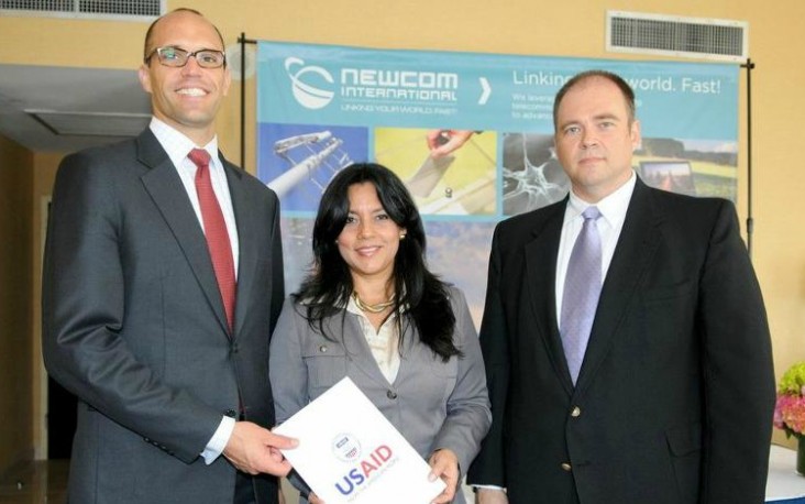 Deputy Assistant Administrator for Latin America and the Caribbean Mark Lopes and officials from NewCom. 