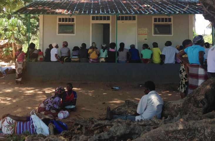 Patients wait to be seen outside of a health facility in Mozambique’s Inhambane Province. 